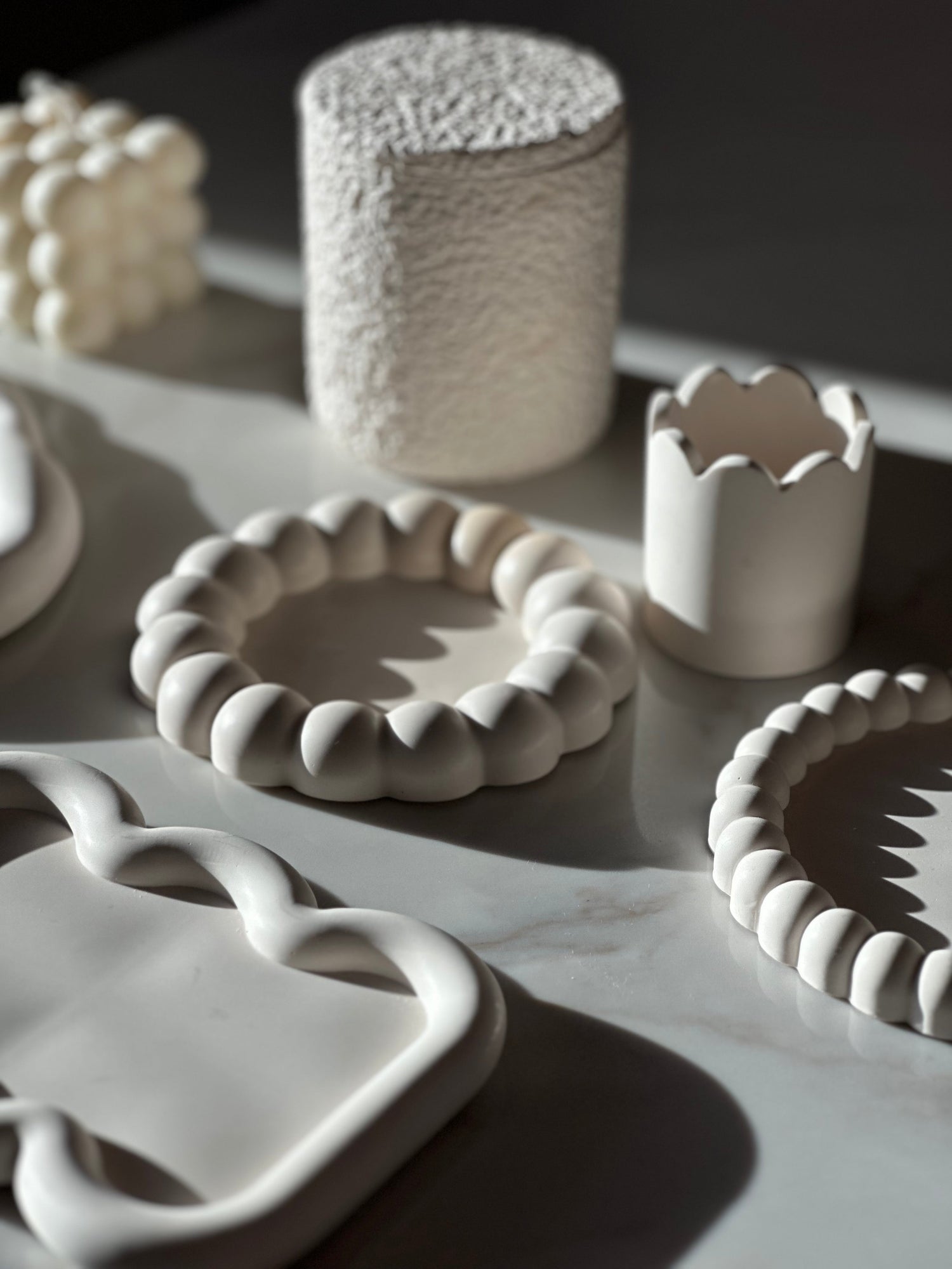 Onoreden’s best-selling sculptural decor pieces arranged in natural light.